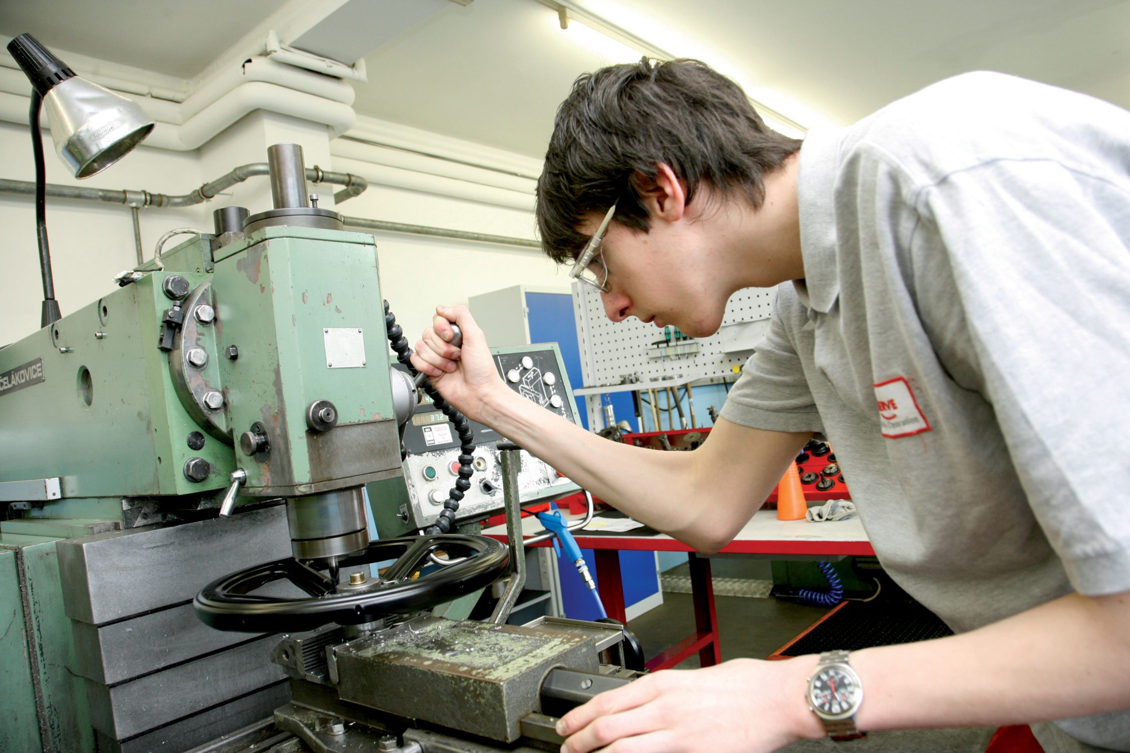 Apprentice of mechatronics in the training lab of Flowserve