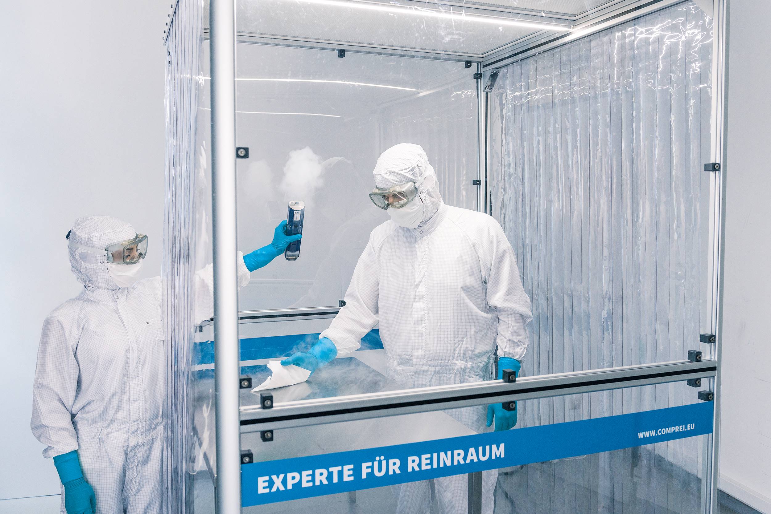 Employees in the clean room of comprehensive