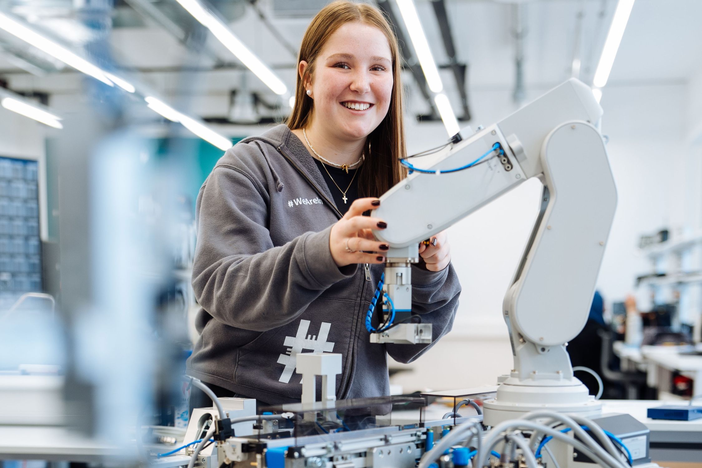 Apprentice working on a machine